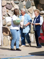 people rehearsing outside